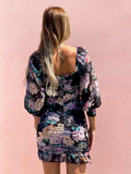 Abito arricciato nero con fiori rosa