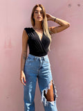 Jeans con maxi spacco
