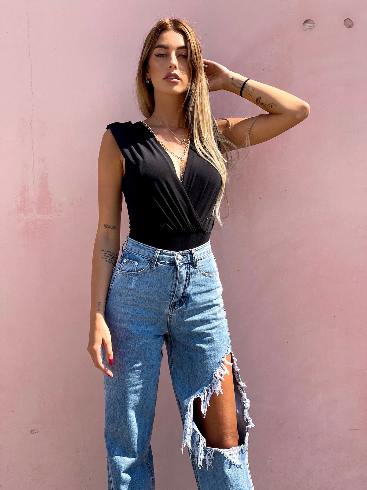 Jeans con maxi spacco
