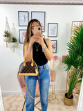 Jeans a vita alta con spacco inferiore