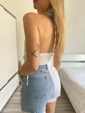 Top in raso bianco con catena argento