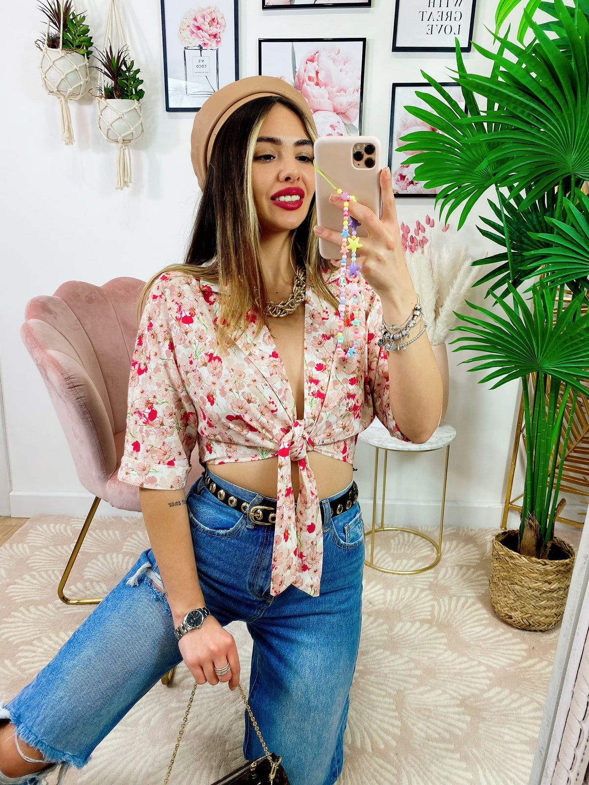 Blusa floreale con fiocco