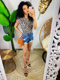Maglia con spalline bombate a fantasia maculata