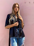 Blusa o kimono con frange