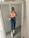 Jeans con borchie