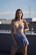 Body rosa con fiori