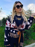 Cardigan corto frange e cinta con cavallo nero