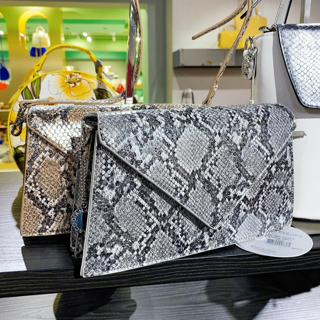 Bag rettangolare pitonata a triangolo