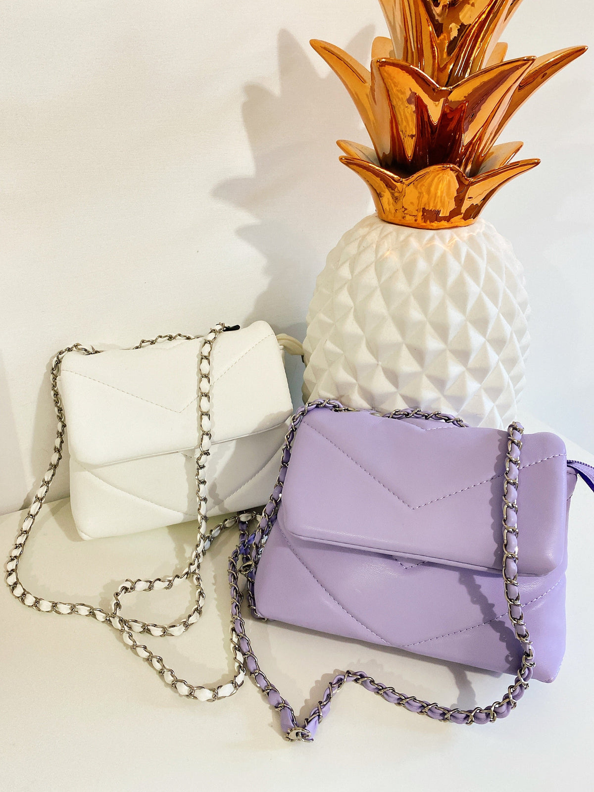 Pochette a mano con catena