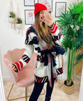 Cardigan con frange e cinta a righe e ricami