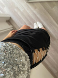 Gonna aderente nera con punto luce