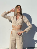 Completo top e pantalone beige
