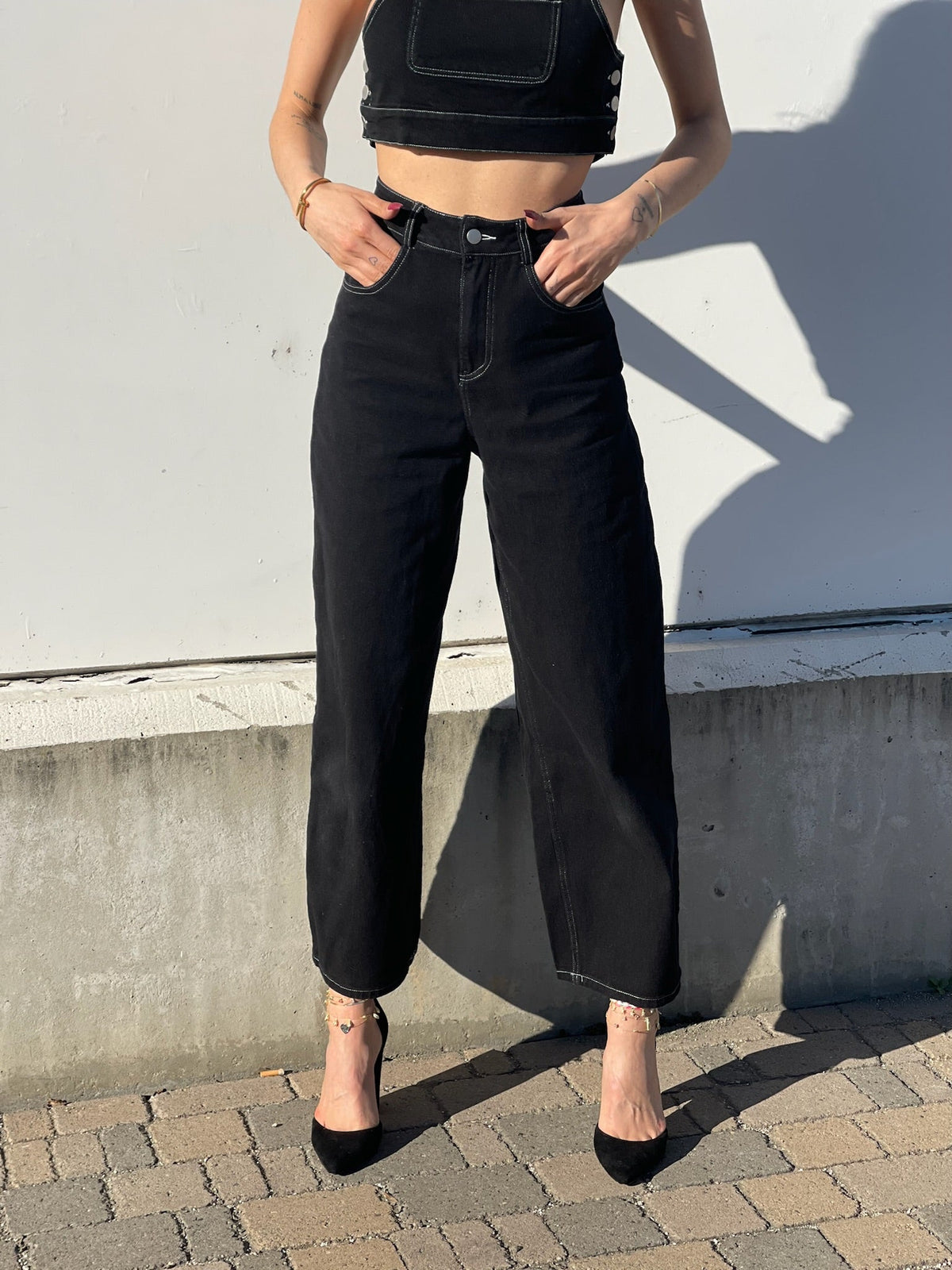 Completo top e jeans nero