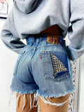 Short Levi’s Vintage bagno medio con borchie
