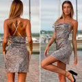 Abito in raso animalier con catena