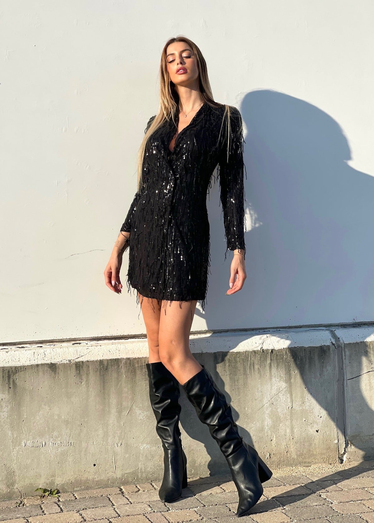 Abito nero frange in paillettes