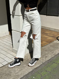 Jeans bianco con strappo