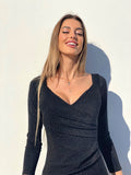 Abito glitter nero scollo a cuore