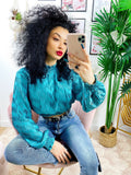 Blusa in raso effetto 3d