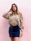 Cardigan panna a trecce