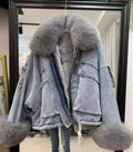 Giaccone di jeans con eco-pelliccia grigio.