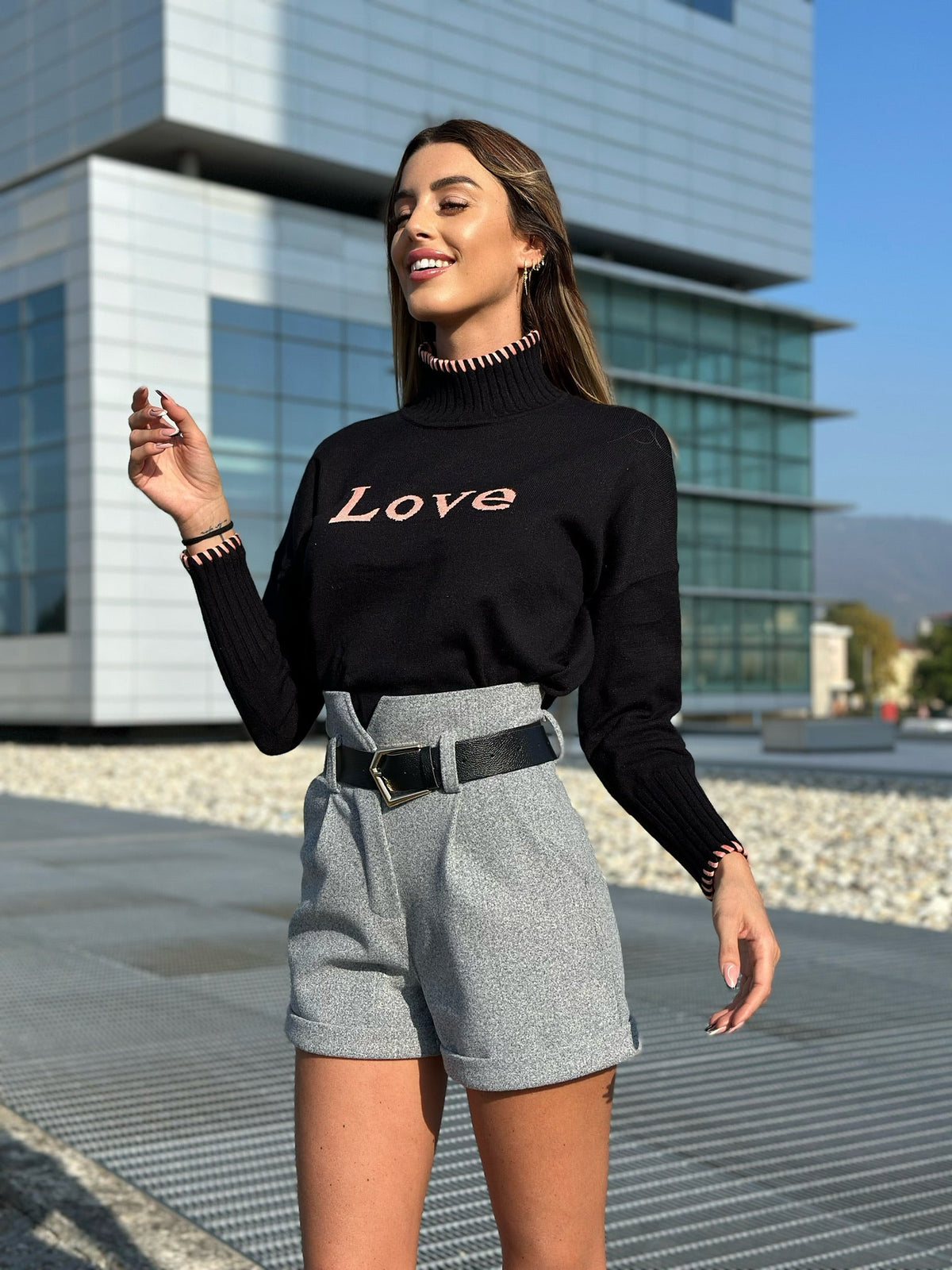 Pull nero e rosa