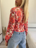 Camicia floreale corallo