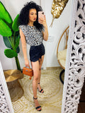 Maglia con spalline bombate a fantasia maculata