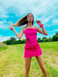Abito in raso con arricciature fuxia