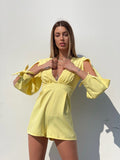 Tutina gialla con fiocchetti