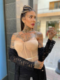 Body con trasparenze e catena nude