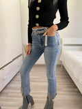 Jeans con frange argento