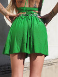 Completo top e gonna verde