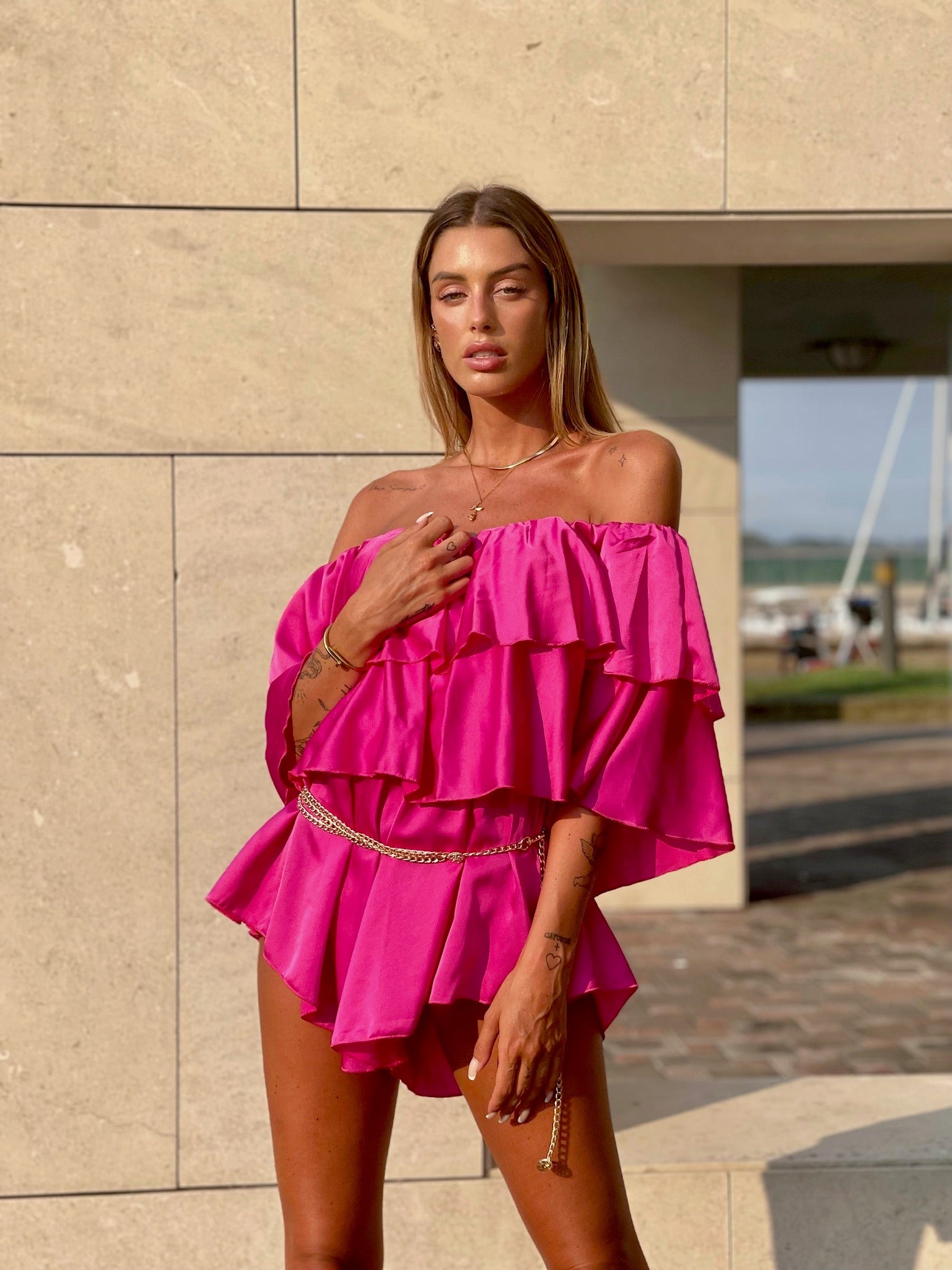 Tutina Fuxia scollo a barchetta e balze