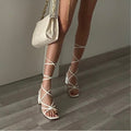 Sandali lace bianchi