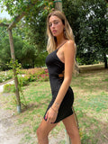 Abito aderente nero schiena incrociata