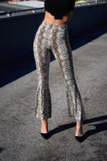 Pantalone a zampa pitonato