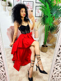 Gonna asimmetrica rossa con fiocco