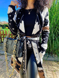 Cardigan camel nero con frange e cinta