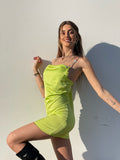 Abito in raso lime con dettaglio luce