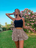 Top nero con incroci