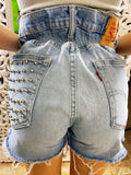 Short Vintage Levi’s jeans medio chiaro con borchie argento
