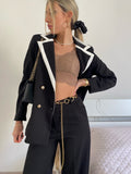 Completo giacca e pantalone nero e bianco