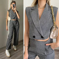 Completo top crop e pantalone grigio