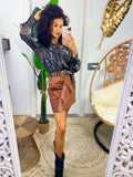 Blusa con ricami nera