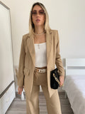 Completo giacca e pantalone beige