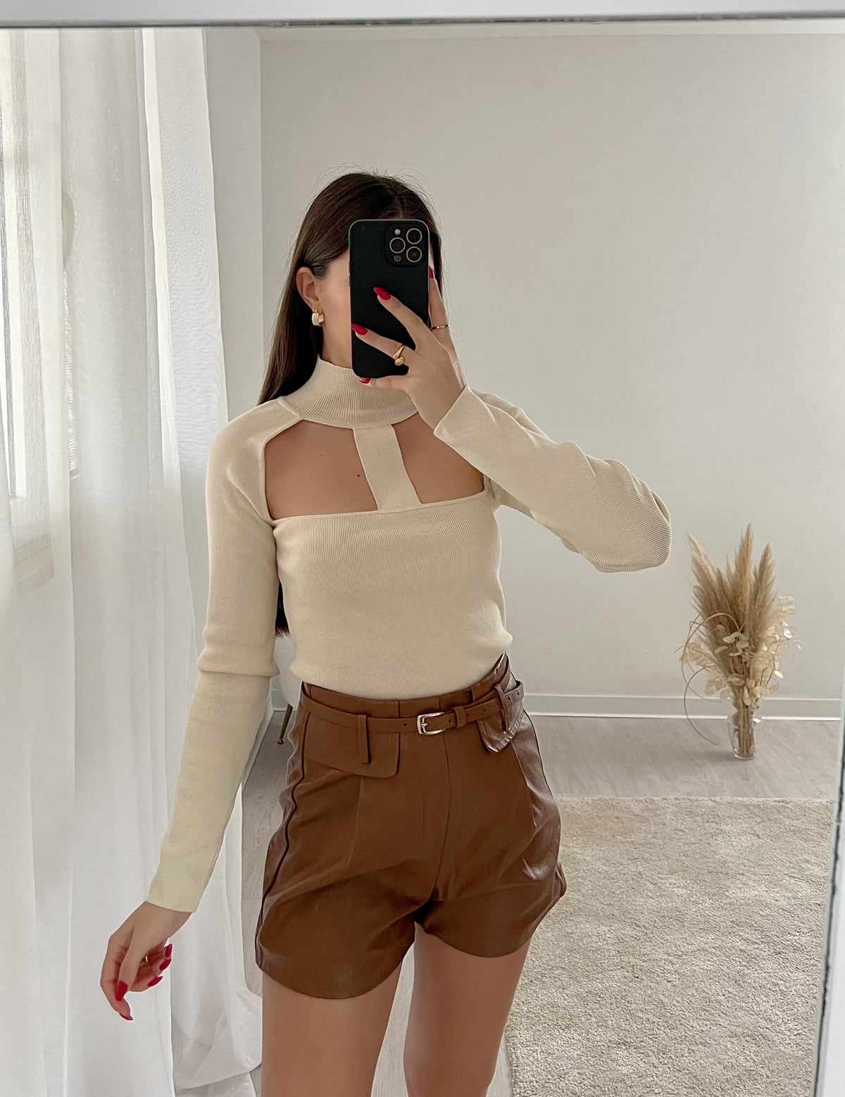 Maglia crema con apertura