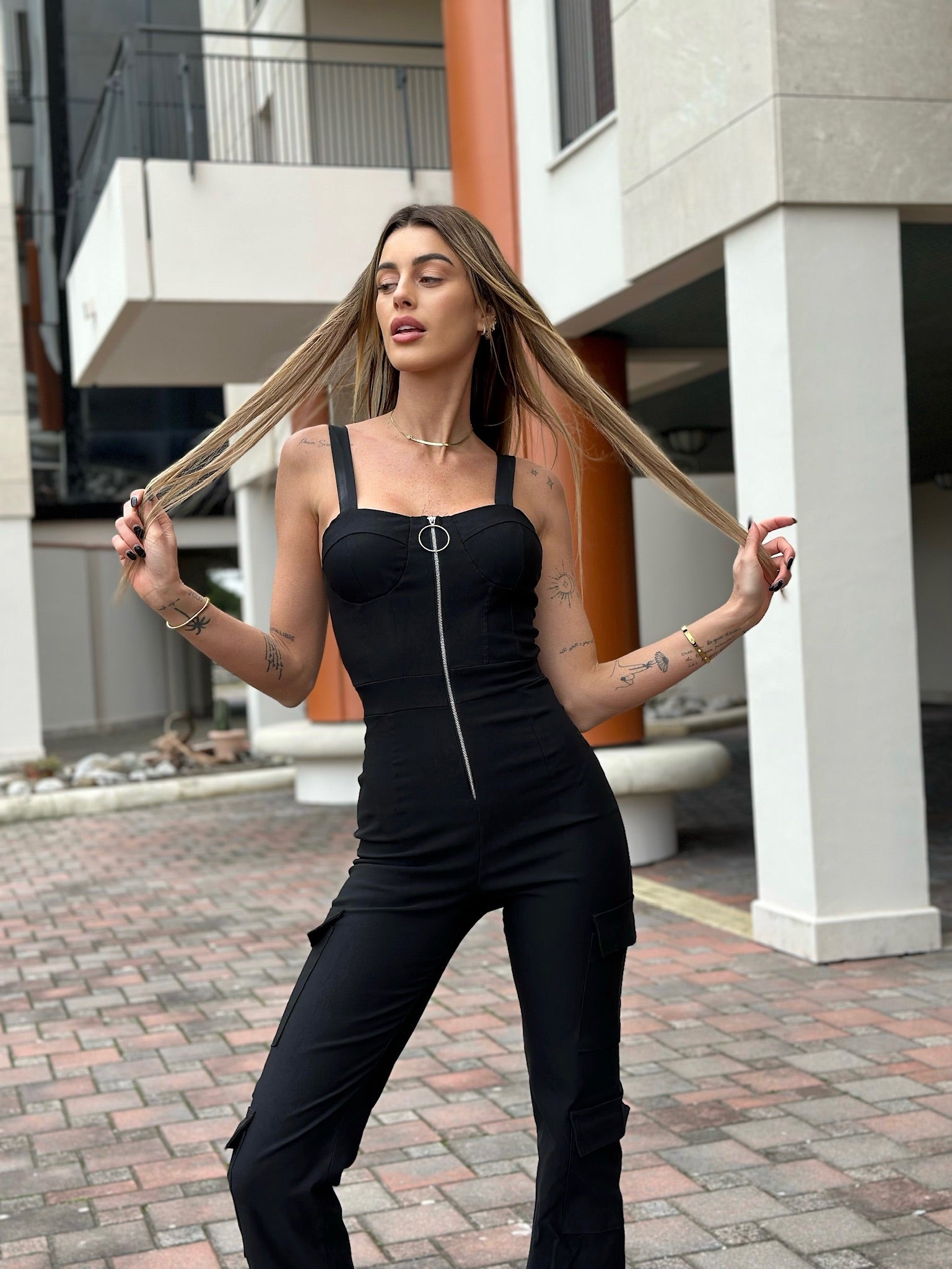 Tuta con zip e tasche