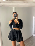 Completo giacca crop e short glitter nero
