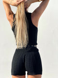 Completo a trecce nero